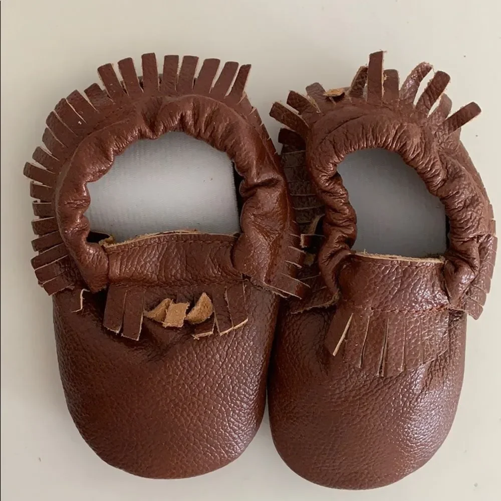 NWOT Brown fringe baby leather moccasins-XL